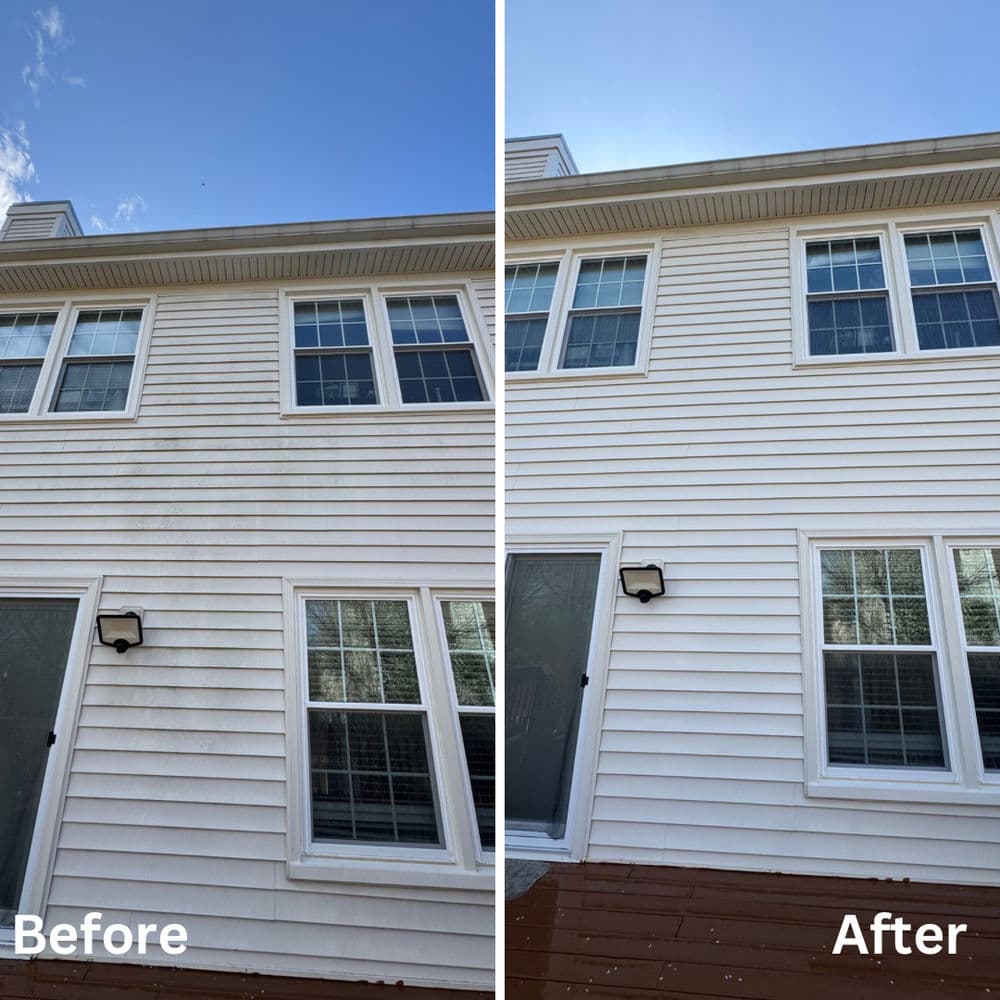 Before and after image of a house exterior, showcasing significant cleaning and restoration.